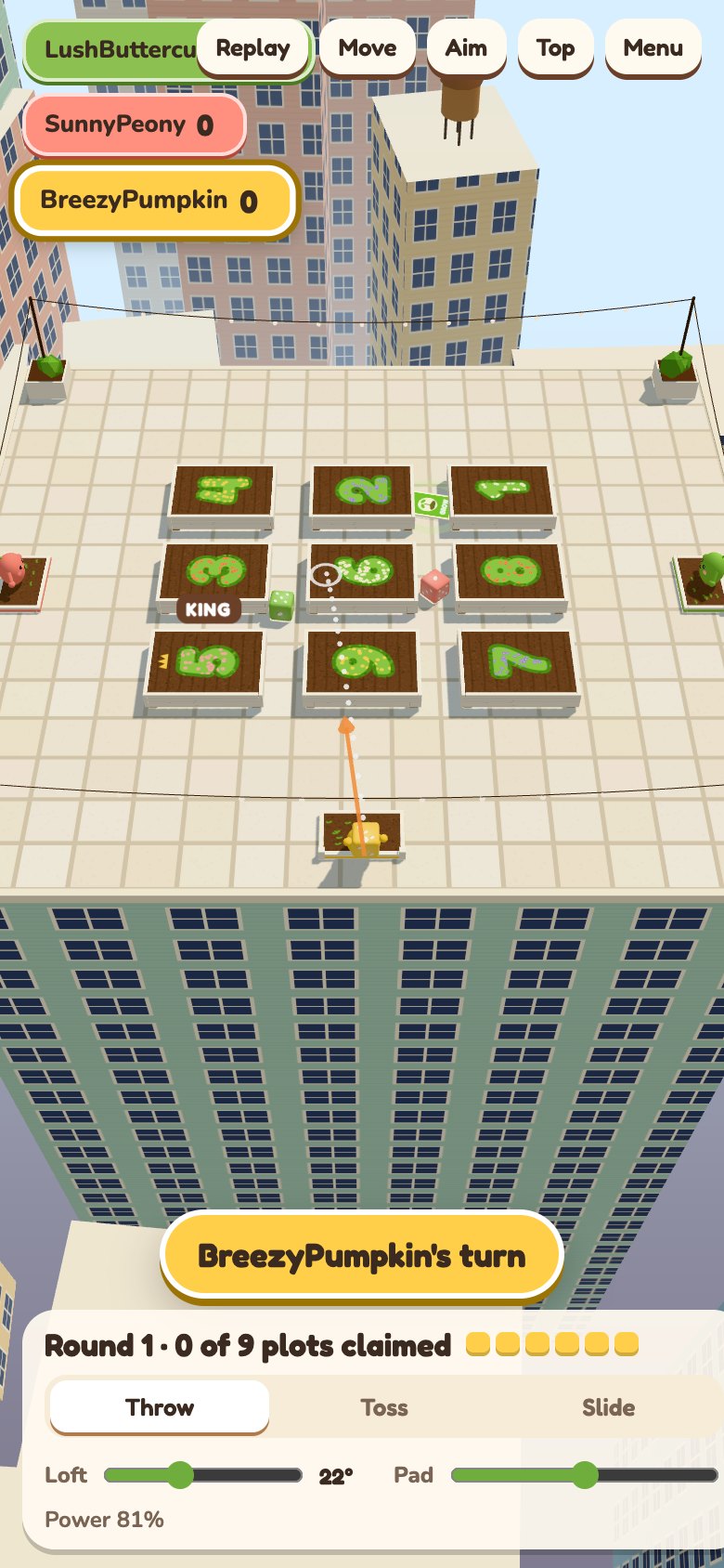 Pulling back a bean on its launcher, with a dotted arc showing where the die will land among the numbered garden boxes